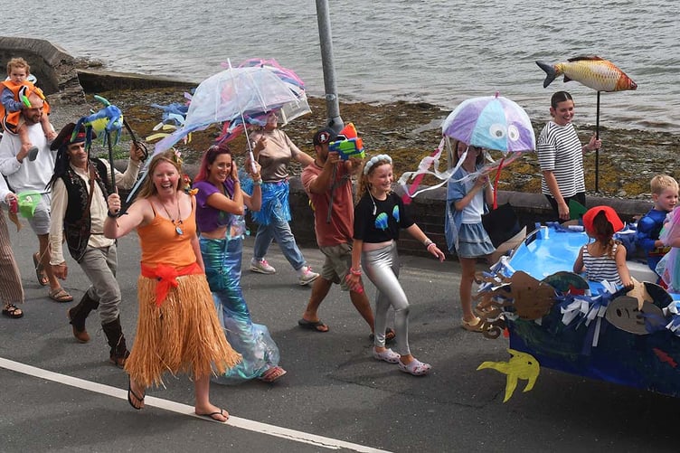 The Dyfi Fest Carnival making its way through Aberdyfi. Photo: Doris O'Keefe