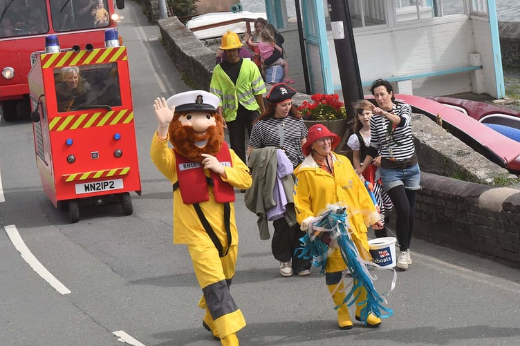 The Dyfi Fest Carnival making its way through Aberdyfi. Photo: Doris O'Keefe