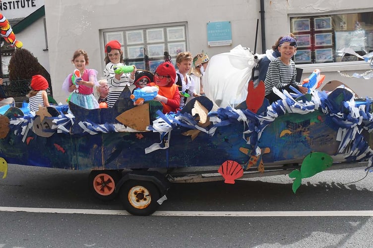 The Dyfi Fest Carnival making its way through Aberdyfi. Photo: Doris O'Keefe