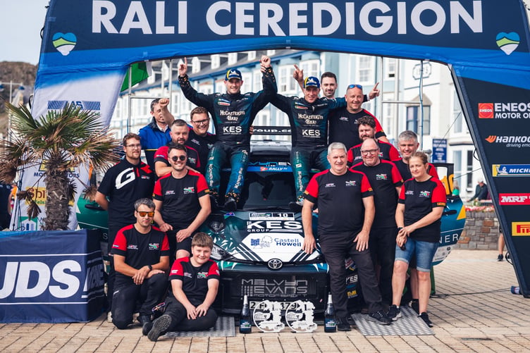 Kris Meeke and Noel O'Sullivan celebrate their success with the team