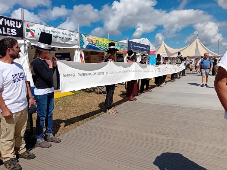 Forming a white line for peace at last month's Eisteddfod.