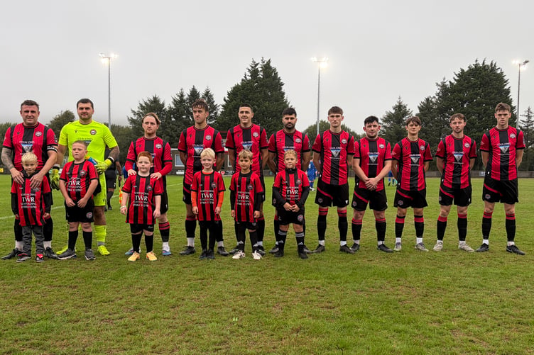 Port with mascots from the club's under 8s side