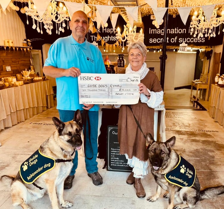 German Shepherd dogs Martin and Domino of Guide Dogs Ceredigion paid a farewell visit to Karen Geobey of Parsley & Thyme in Aberaeron