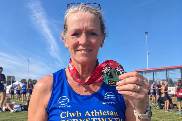 Elaine with her Great North Run medal