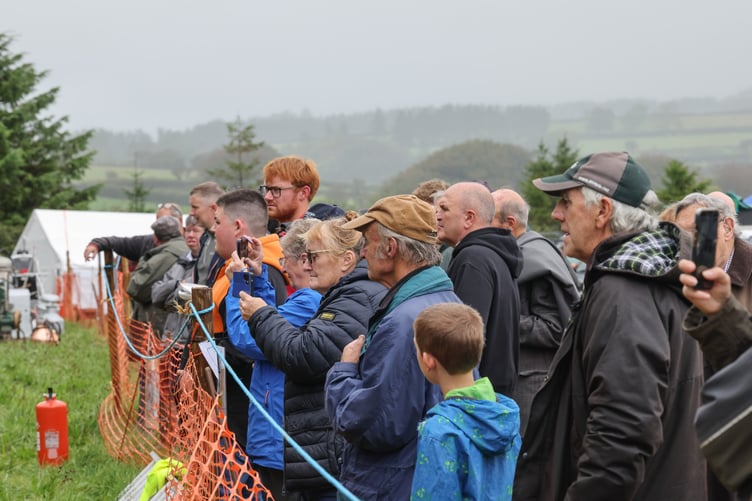 A large crowd of onlookers enjoyed the thrashing and baling demo