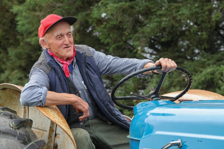 Fordson Major tractor with its driver Iwan Evans waiting to move it into gear