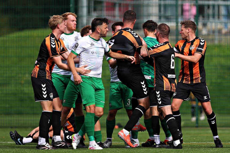 BANGOR, GWYNEDD, WALES - 19th SEPTEMBER 2026 - Both teams scuffle during Menai Bridge Tigers vs Aberystwyth Town in Round 1 of the FAW Welsh Cup at Treborth, Bangor (Pic by Sam Eaden/FAW)