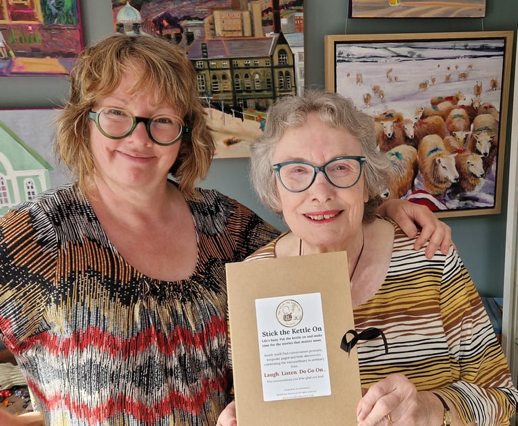 Sue Dewhurst and her mother Ann with a Stick the Kettle On kit