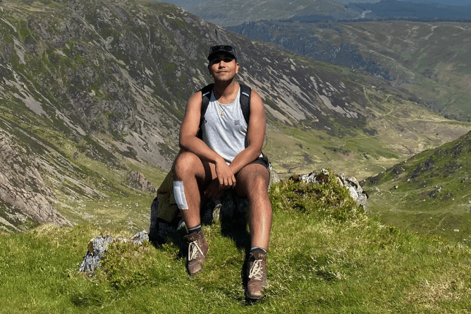 Aberystwyth Town Councillor Nishant Chandolia during a previous mountain hike