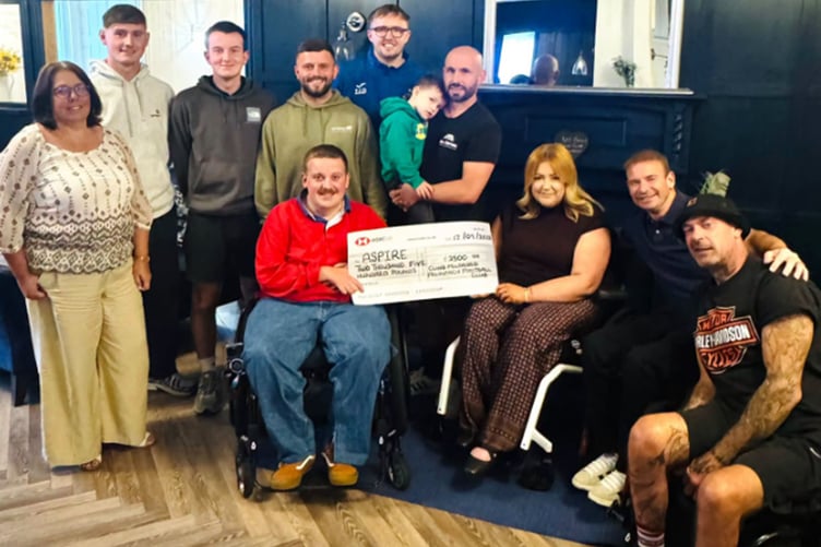The cheque presentation to Aspire Cardiff