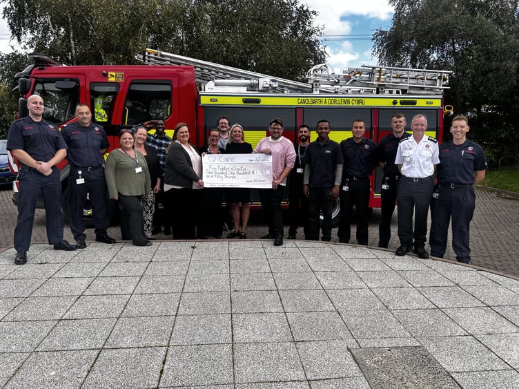 £1,150 was raised in memory of Heather Edwards, the cheque was handed to the Fire Fighter's Charity. Photo: Q Care