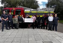 Q Care staff raise over £1,000 for Fire Fighters Charity in memory of Heather Edwards