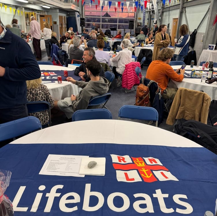 Sun sets over Pwllheli RNLI charity Hog Roast evening. Photo: RNLI/Caroline Jones