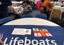 Pwllheli RNLI hosts successful charity hog roast
