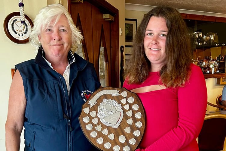 Angharad Basnett being presented with the MWCGA Best Gross prize