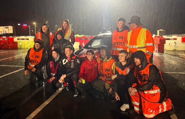 Elfyn Evans with volunteers