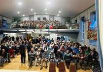 Hundreds pack hall in bid to save New Quay surgery