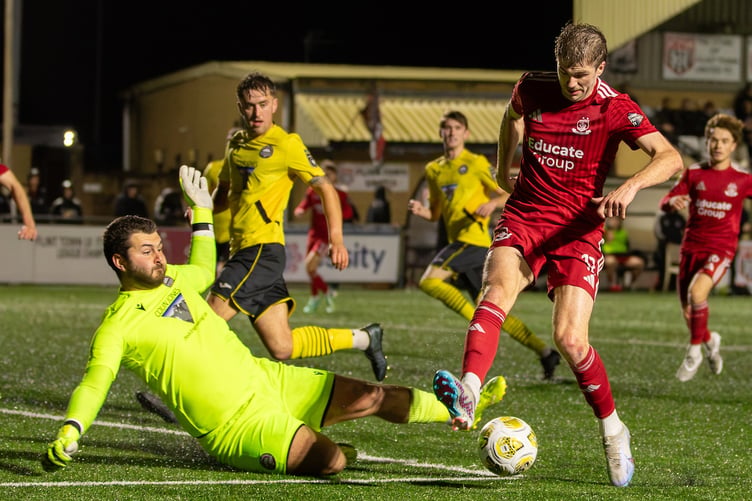 FLINT, WALES - 16 OCTOBER 2026: Porthmadog goalkeeper Robbie Williams denies Harry Franklin of Connah's Quay Nomads during the FAW Welsh Cup match between Connah's Quay Nomads and Porthmadog at Essity Stadium, Flint, Wales. (Pic by Nik Mesney/FAW)