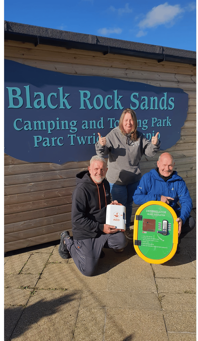 The defibrillator and cabinet have been presented to Black Rock Sands Camping and Touring Park