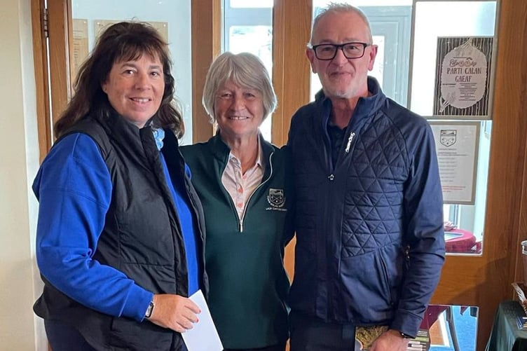 Sue Hampson and Paul Allen with lady captain Janet Taylor