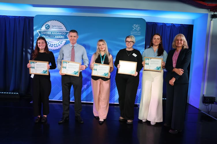Representatives from Bryn Elian, David Hughes, Abererch, John Bright and Maes Garmon celebrate receiving their Silver Awards at the Careers Wales Quality Award ceremony in Cardiff on 13 October 2026