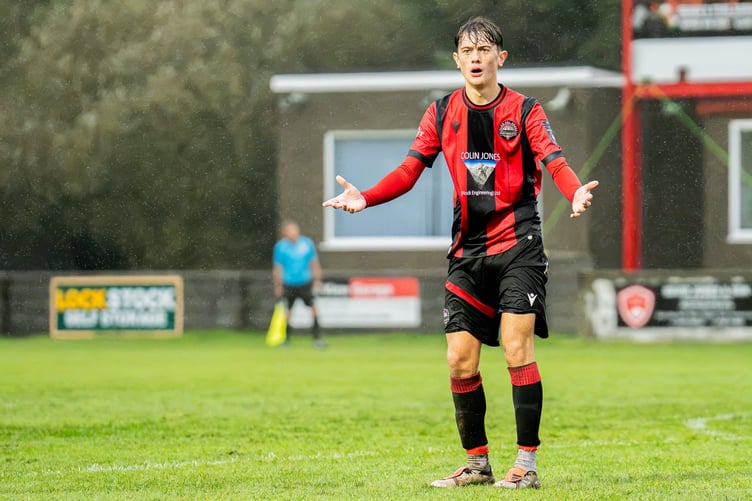 Consternation from a player in the Porthmadog v Brickfield Rangers game